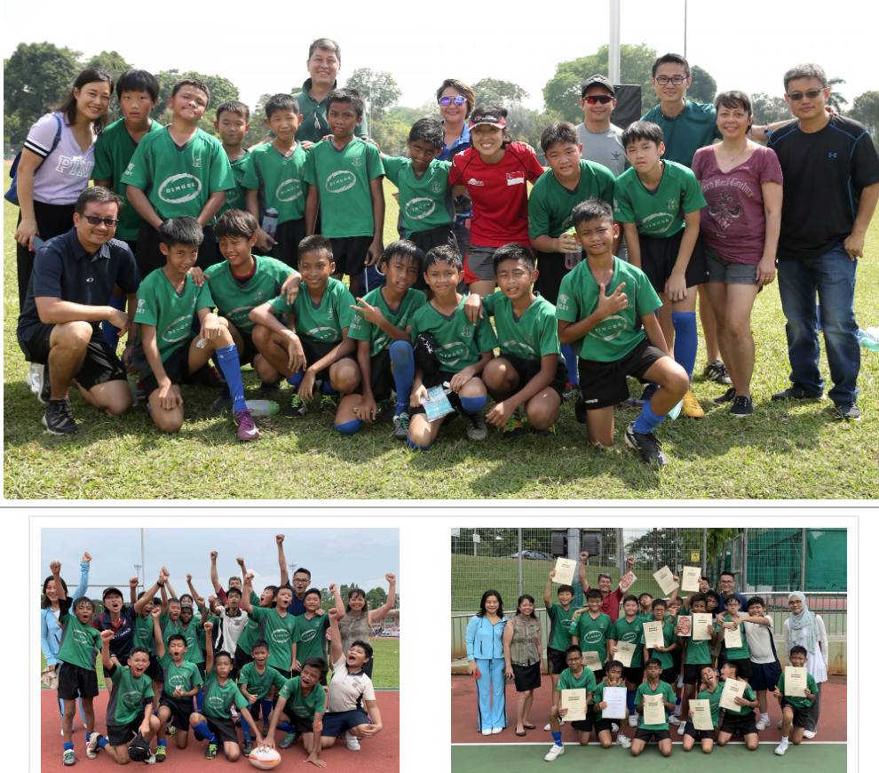 A youth rugby team in green jerseys poses with adults on a field, celebrating with raised arms and holding certificates.
